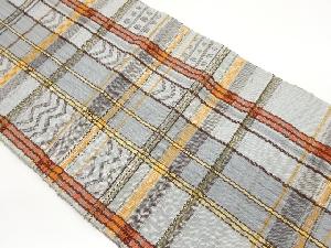 手織り真綿紬格子に抽象模様織出し名古屋帯